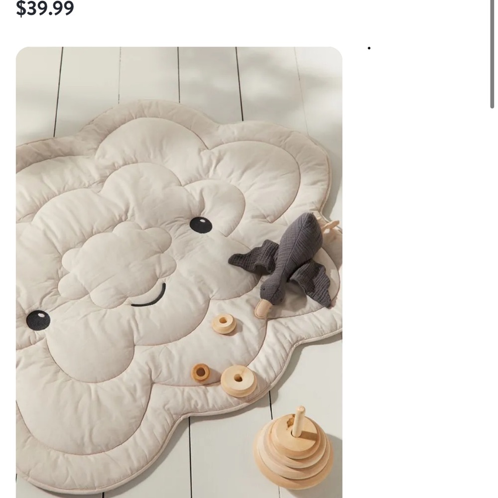 Playful, cloud-shaped mat provides a soft play area